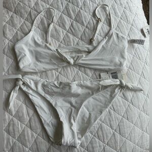 Lspace white Bikini top is a medium bottom is a large**